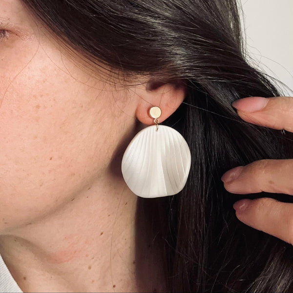Shell Dangle earrings worn on ear – graceful, calming, handmade jewelry